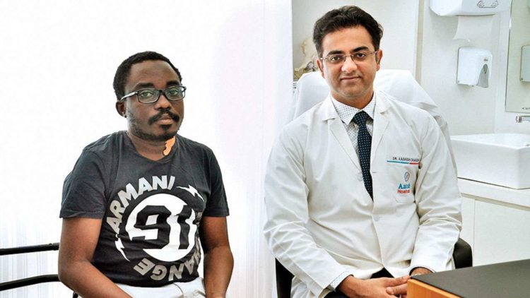 0_1534141615979_Doctors at Aakash Healthcare in Delhi help Nigerian get to his feet.jpg