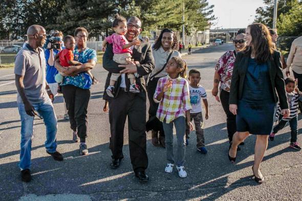 0_1528372654871_Anthony-Wright-walks-free-with-family-members.jpg