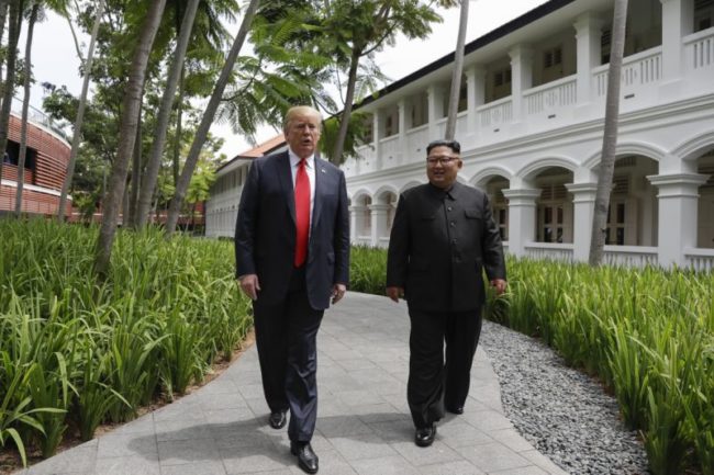 0_1528789445673_Trump-and-Kim-walk-together.jpg