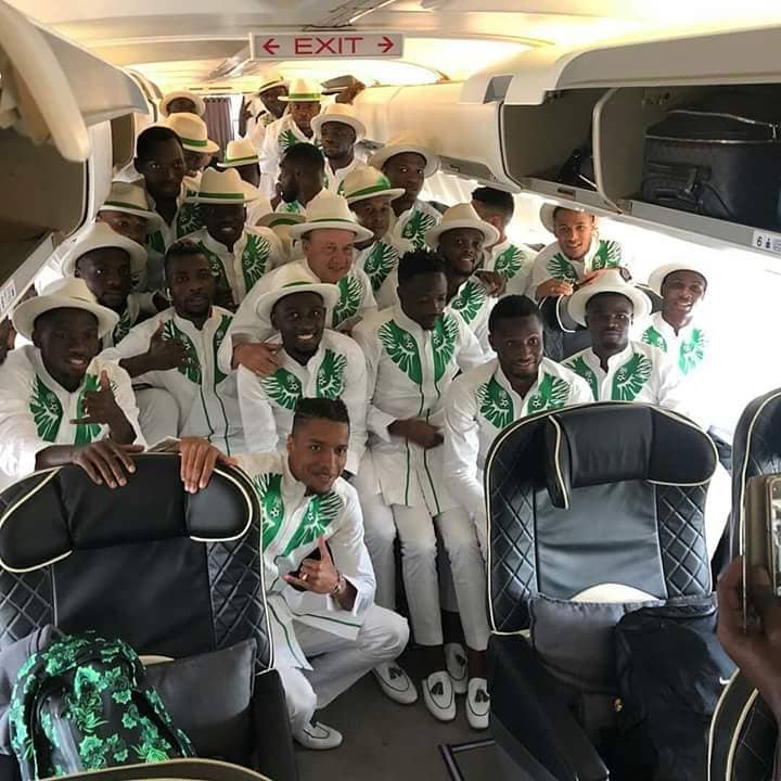 0_1528809615991_Super-Eagles-with-Coach-Gernot-Rohr-displaying-their-uniform-in-Russia-bound-aircraft.jpg