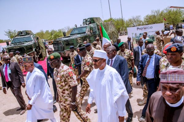 0_1530998370951_President-Buhari-arriving-in-Monguno-for-the-Army-Day-e1530916236285.jpg